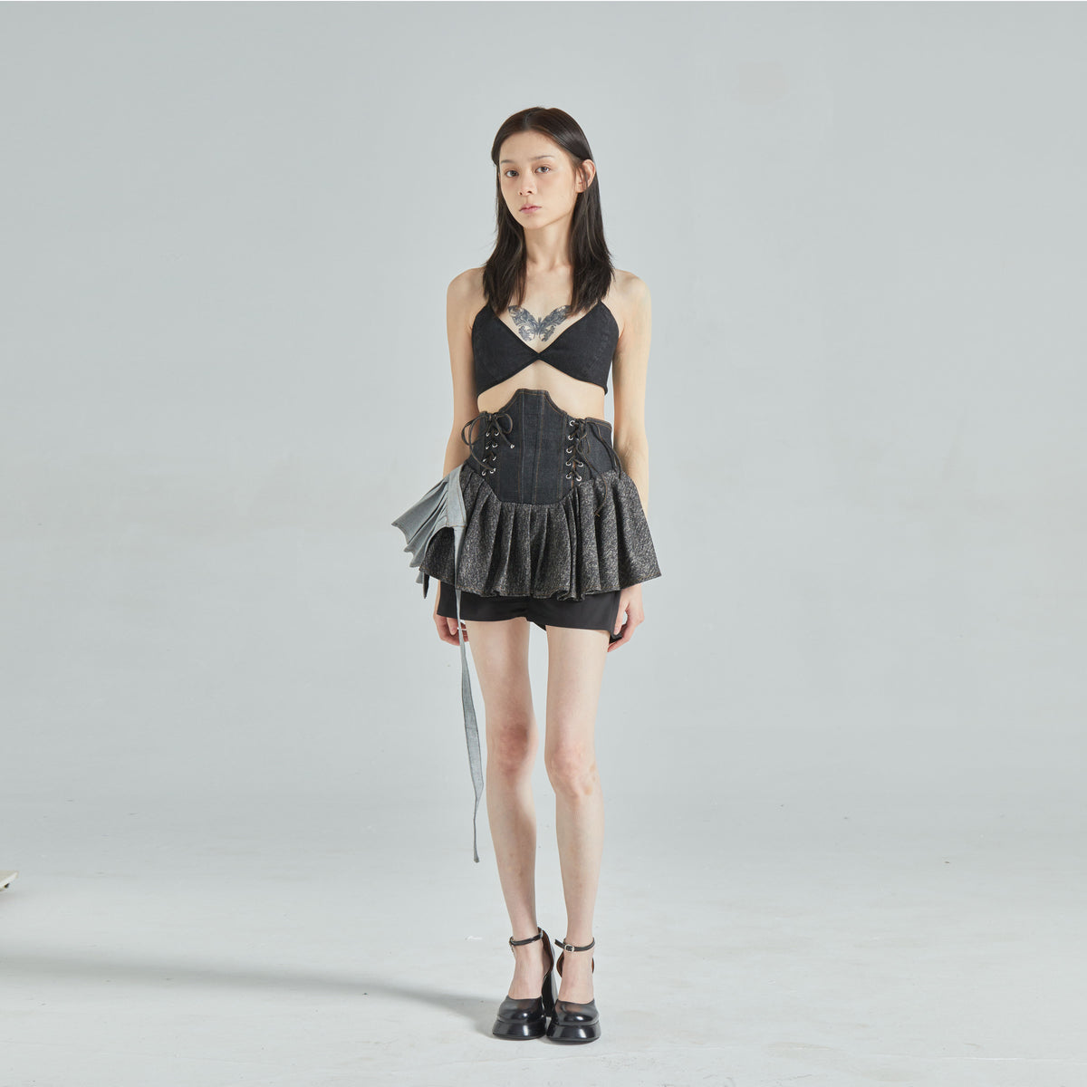 High-Waisted Boned Denim Asymmetrical Ruffled Skort