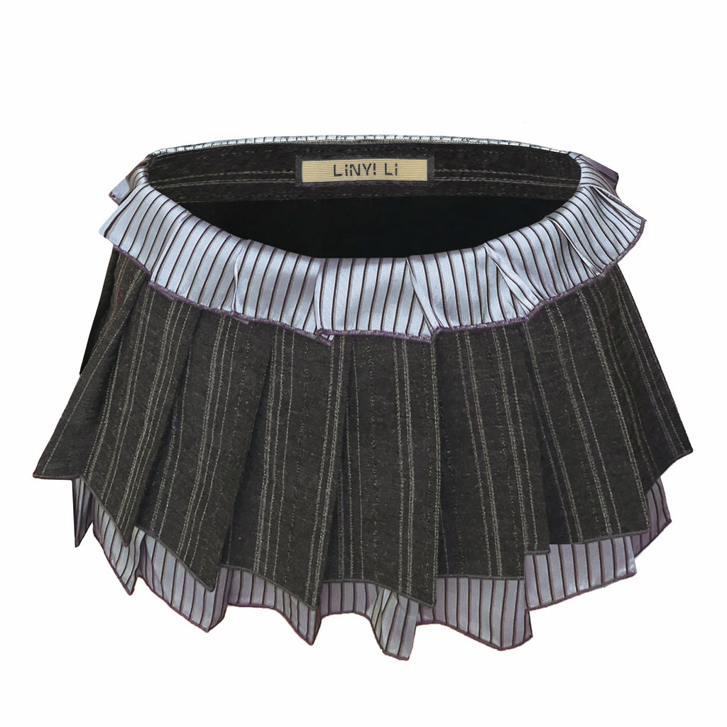 Completo top a corsetto all'americana preppy e minigonna a pieghe
